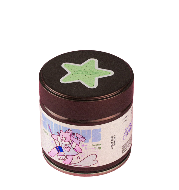 Kuma Dark Roast Hojicha tin by xundays with a mint star lid and illustrated label