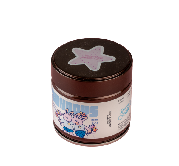 Mimi Matcha tin by xundays with a pink star lid and illustrated label